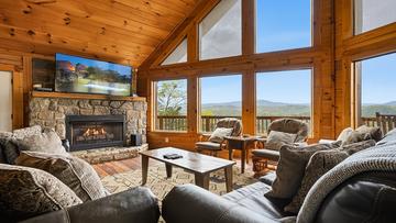 Large windows bringing the Smoky Mountains indoors to your living area.