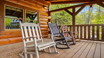 Relaxing rockers on the porch of your Smokies cabin rental.  