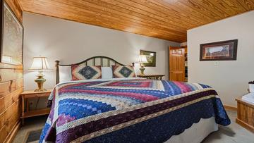 Cabin Rental King Bed Comforting king size bed at your cabin in the Smokies.