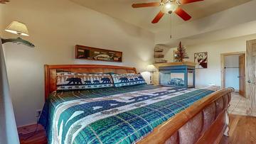 King Sized Log Bed King Suite featuring a romantic log style bed.