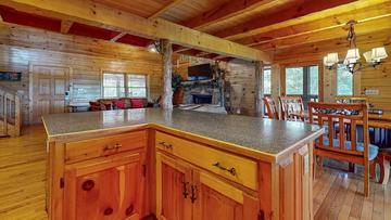 Open Cabin Kitchen Area Don't miss out from the family while serving up meals and snacks.