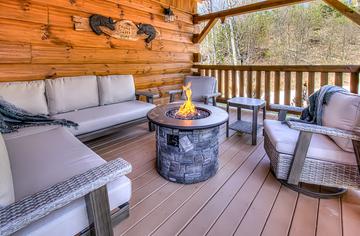 Covered gas fire pit at Smoky Mountains rental cabin. at A Point of View in Gatlinburg TN