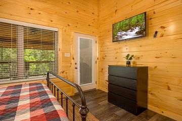 Television in your second cabin bedroom. at Big Splash Lodge in Gatlinburg TN